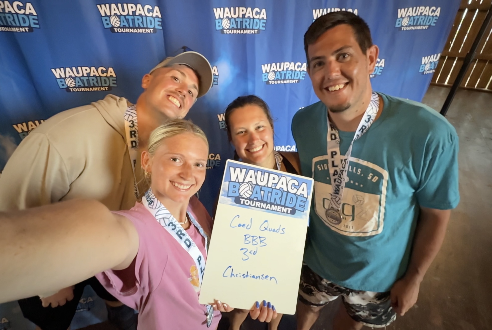 Omahotties co-ed quads team with their 3rd place medals at the Waupaca Boatride Tournament