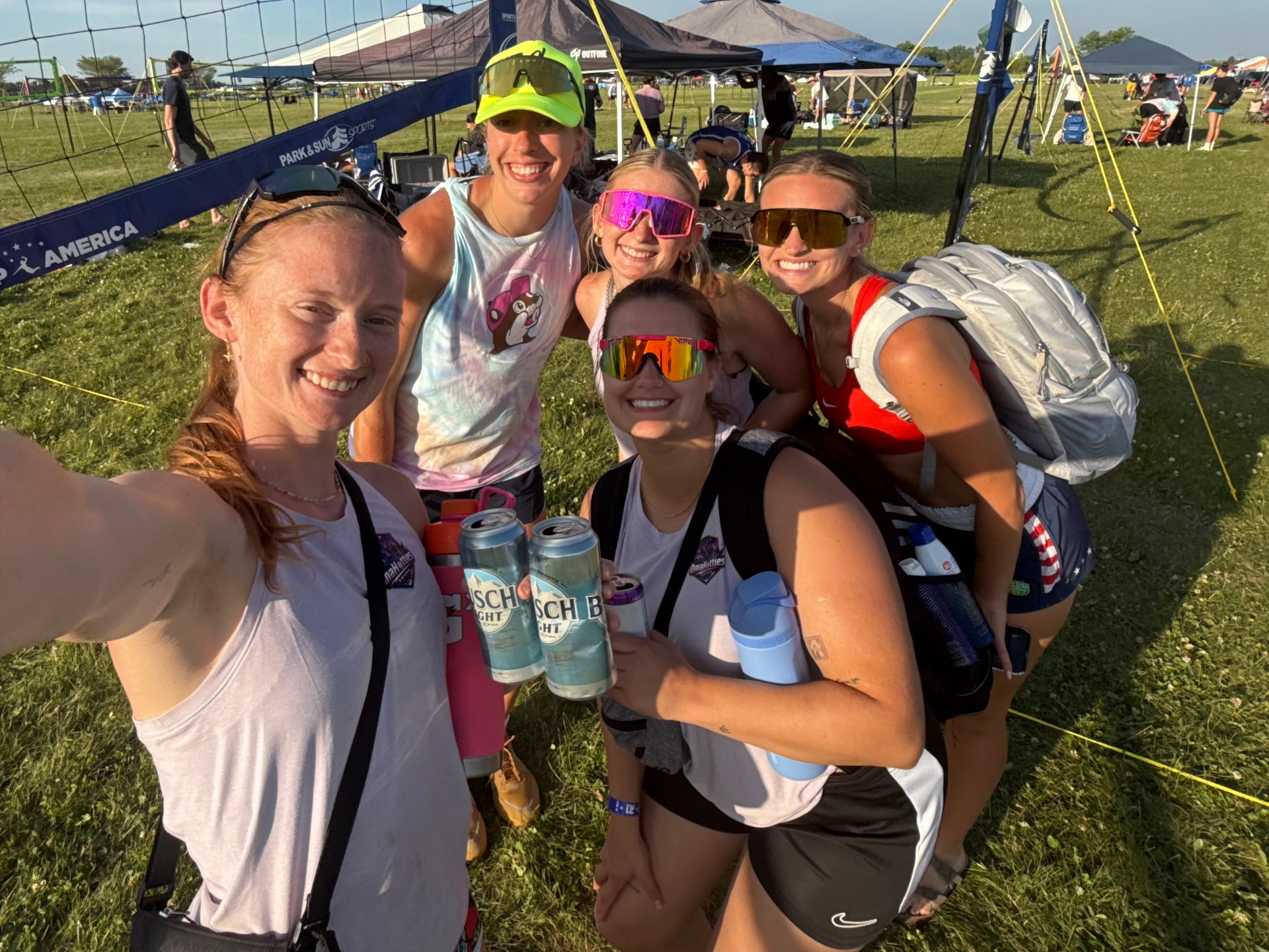 Omahotties crew taking a selfie on the grass courts