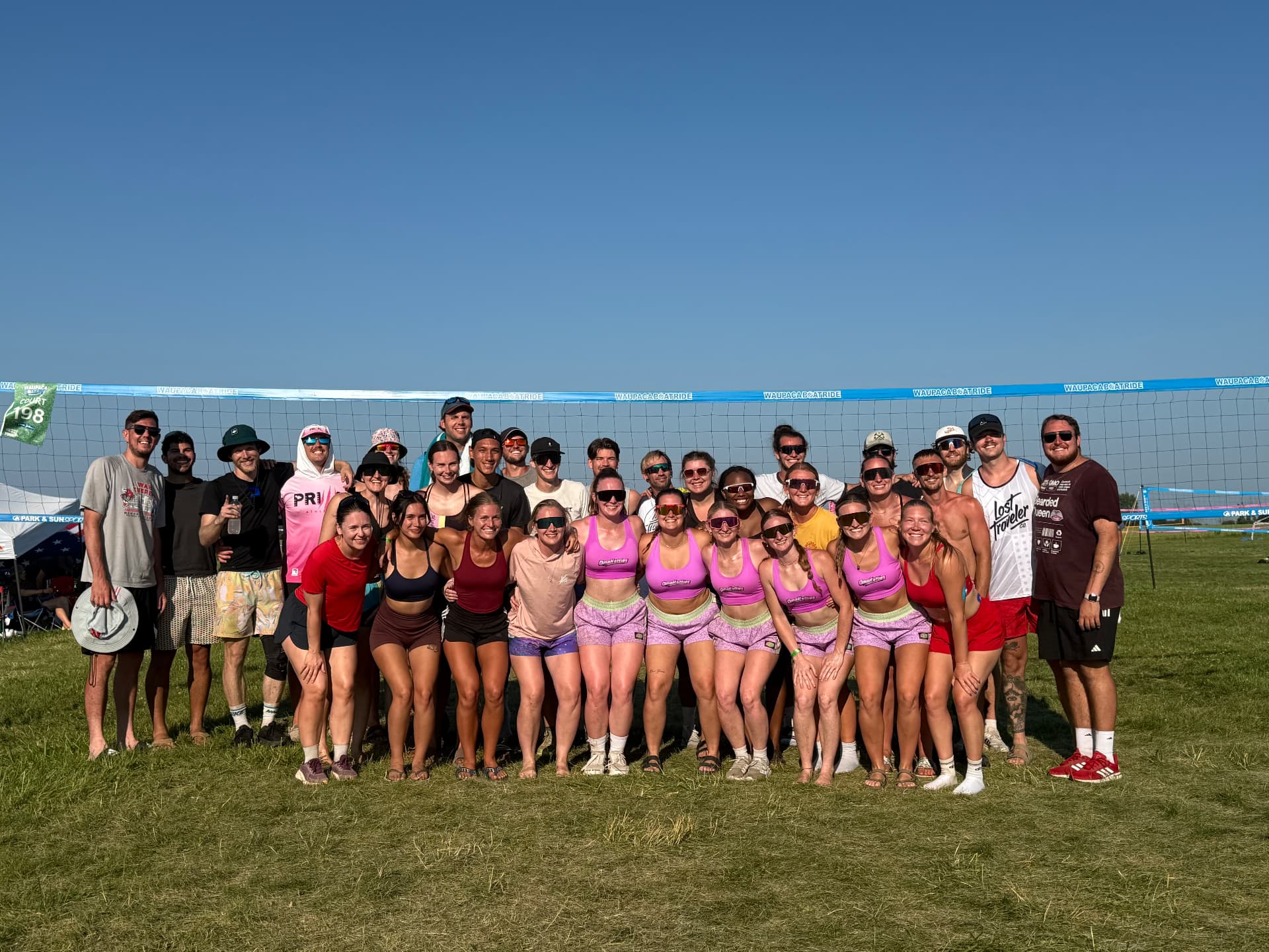 Omahotties team group photo at Waupaca Boatride grass tournament